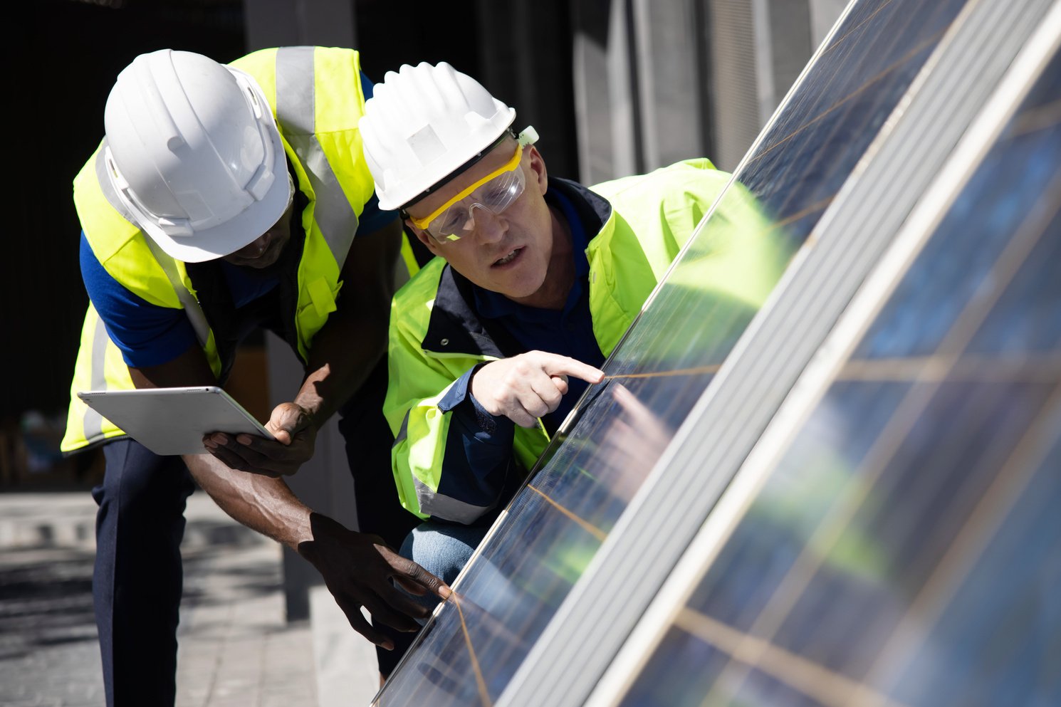 Two Engineers Checking Solar Panels